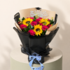 Graduation bouquet with red roses, sunflowers, black wrapping, and graduation topper by Marino Flowers