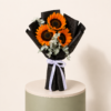 3 sunflowers bouquet with eucalyptus and black wrapping by Marino Flowers