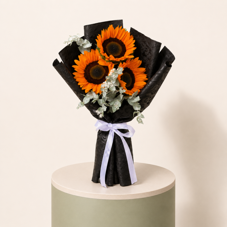 3 sunflowers bouquet with eucalyptus and black wrapping by Marino Flowers