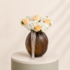 Elegant ivory blush roses and white hydrangeas arranged in a luxury decorative vase by Marino Flowers.