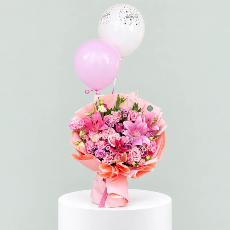 Blush Milestone – Pink Lily Graduation Bouquet with Balloons